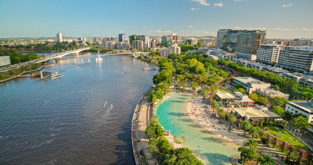Streets Beach at South Bank with Brisbane River and city skyline