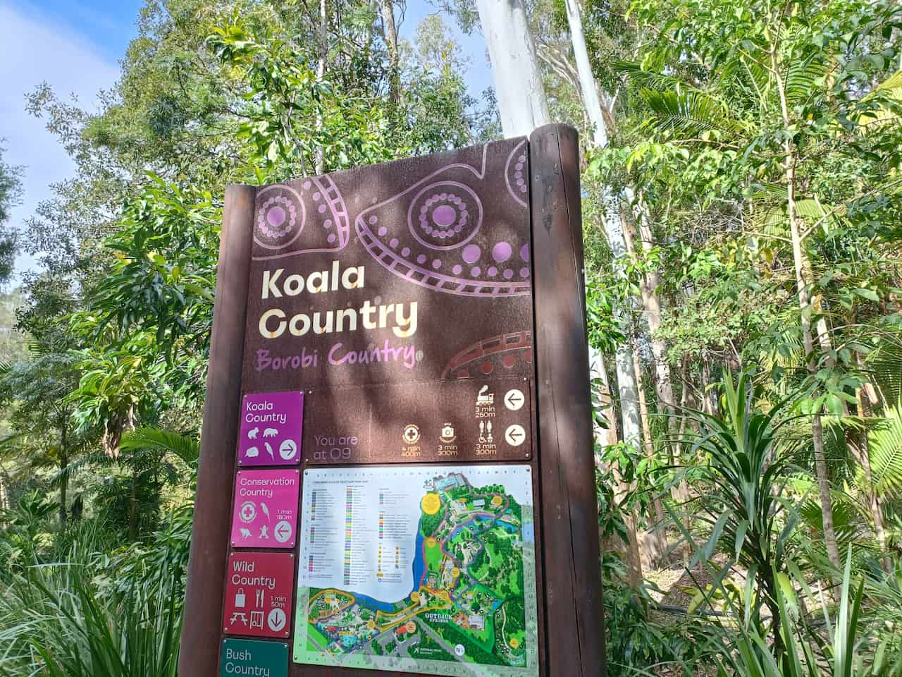 Koala Country sign at Currumbin Wildlife Sanctuary on the Gold Coast surrounded by natural forest