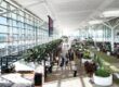 Brisbane Airport departure lounge with travellers